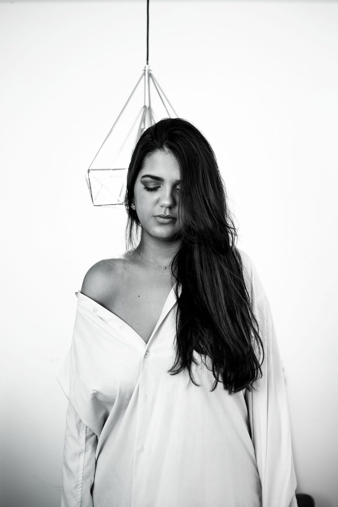 Portrait — off-shoulder white shirt