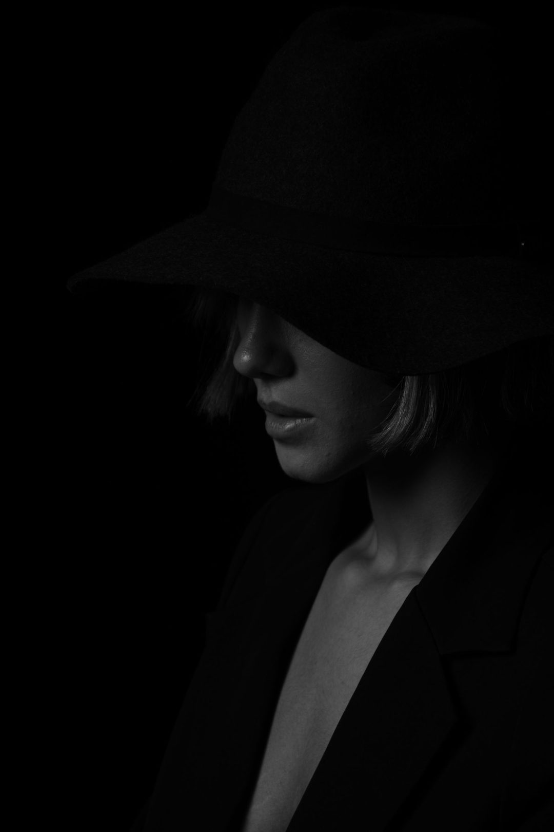 Profile under wide-brim hat