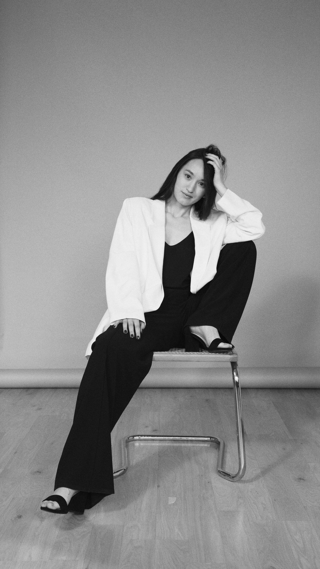 White blazer on studio stool