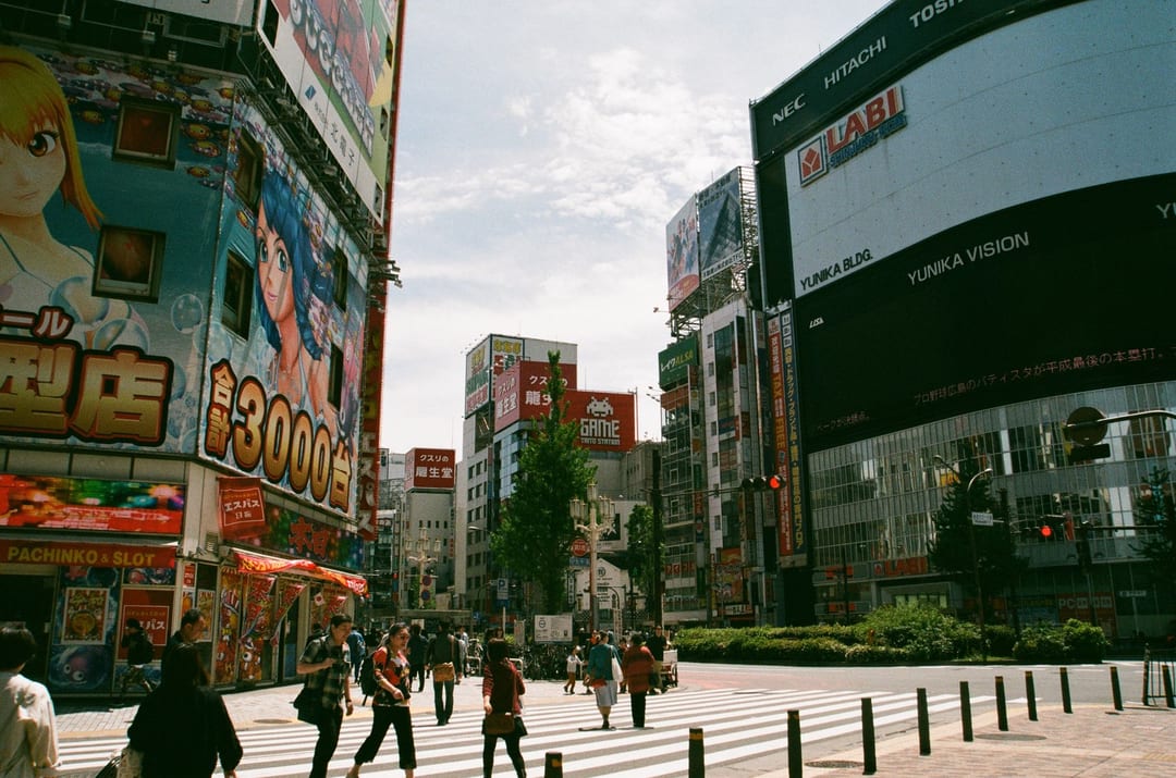 Street scene under large billboards