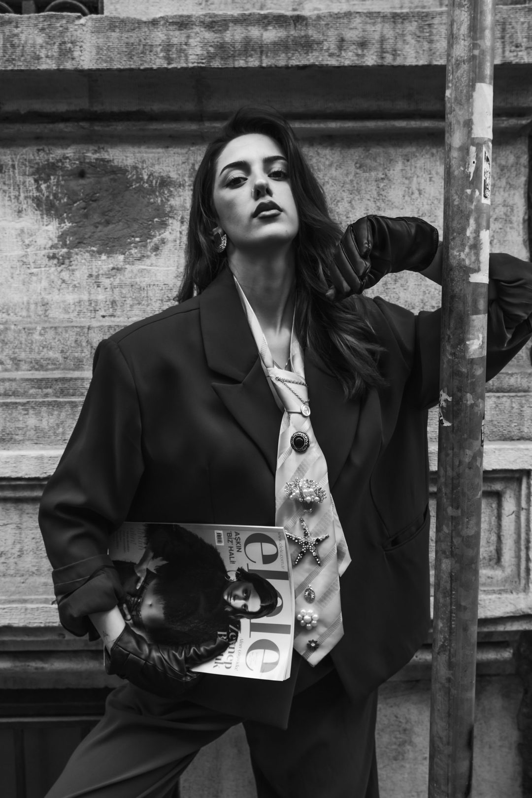 Portrait against a weathered doorway, tie loosened
